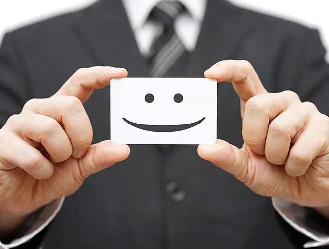 our clients are happy clients, smile on business card